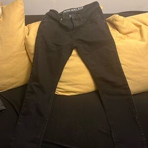 Black stretchy jeans.